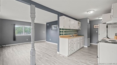Move-in ready lakeview cabin featuring 2 bedrooms, 1 bath, and - photo 2