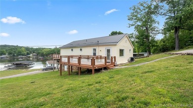 Move-in ready lakeview cabin offering 3 bedrooms, 2 baths, and - photo 1