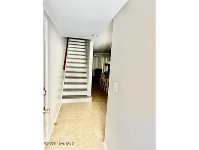 This rarely available Stones Throw villa is tucked beneath a - photo 4
