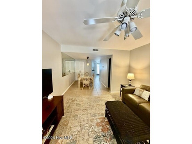 This rarely available Stones Throw villa is tucked beneath a - photo 9