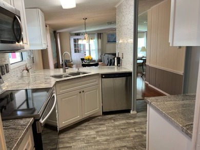 $54,000- This great manufactured 2/2 home is on leased land with - photo 4