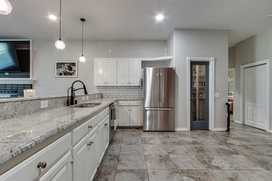 Set on nearly an acre (MOL) in Northwood Lake Estates, this - photo 11