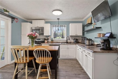 Discover effortless living in Urbanna Creek Farms with this - photo 12