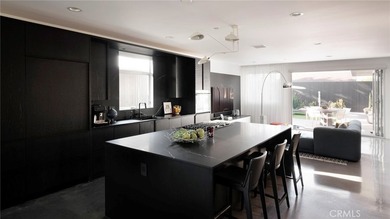 Welcome to a striking architectural residence in the highly - photo 16