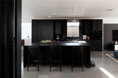 Welcome to a striking architectural residence in the highly - photo 17