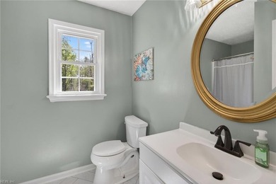Discover effortless living in Urbanna Creek Farms with this - photo 27