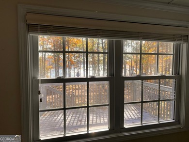 What amazing views of the lake from every window across the back - photo 29