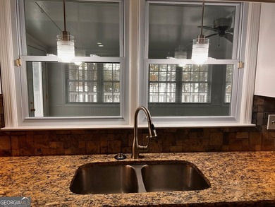 What amazing views of the lake from every window across the back - photo 31