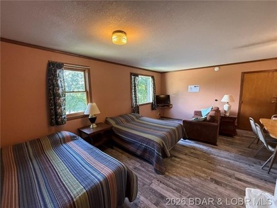 Cabins 8 and 9 are a duplex unit with a connecting door. Just - photo 5