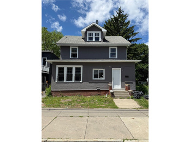 Opportunity awaits at this spacious City of Rochester home - photo 1