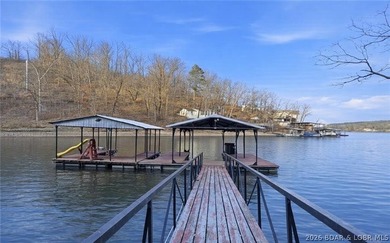 Charming lakefront cabin delivers the perfect blend of - photo 1