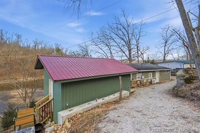 Charming lakefront cabin delivers the perfect blend of - photo 4