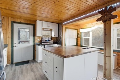Charming lakefront cabin delivers the perfect blend of - photo 7