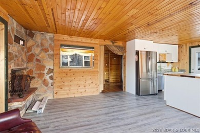 Charming lakefront cabin delivers the perfect blend of - photo 8