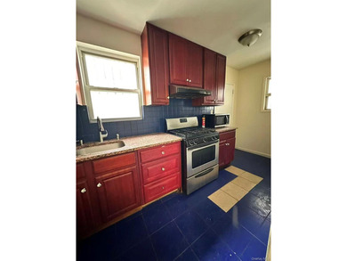 Welcome to 39-21 Janet Place, ideally located in the heart of - photo 2