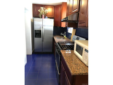 Welcome to 39-21 Janet Place, ideally located in the heart of - photo 3
