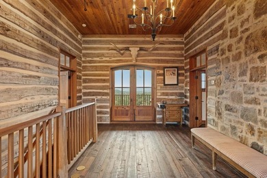 At the heart of the ranch lies a custom two-story home, built in - photo 19