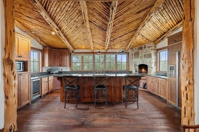 At the heart of the ranch lies a custom two-story home, built in - photo 20