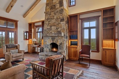 At the heart of the ranch lies a custom two-story home, built in - photo 21