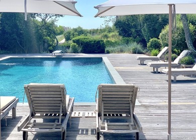 A rare and compelling offering along coveted Dune Road, this - photo 3
