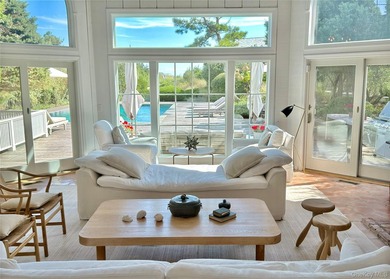 A rare and compelling offering along coveted Dune Road, this - photo 6