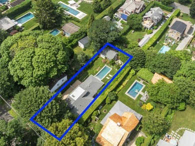 This Southampton Village Cape cod cottage encapsulates the - photo 1