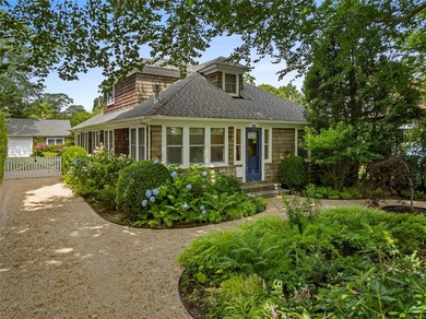 This Southampton Village Cape cod cottage encapsulates the - photo 2
