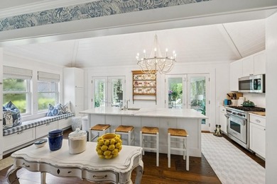 This Southampton Village Cape cod cottage encapsulates the - photo 3