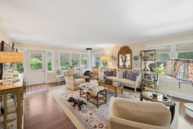 This Southampton Village Cape cod cottage encapsulates the - photo 8