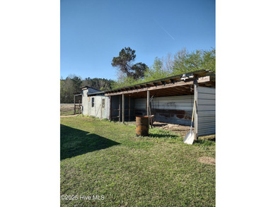 This charming 1985 one-story ranch home sits on 1.44 acres and