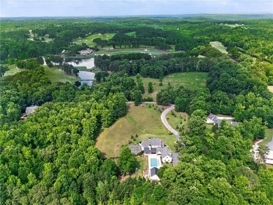 Nestled on 4.11 meticulously manicured private acres, this - photo 7