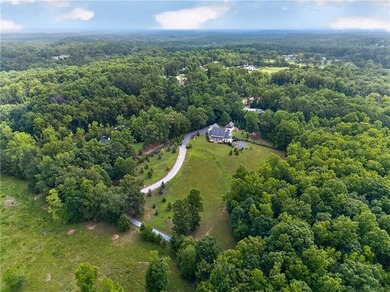 Nestled on 4.11 meticulously manicured private acres, this - photo 9