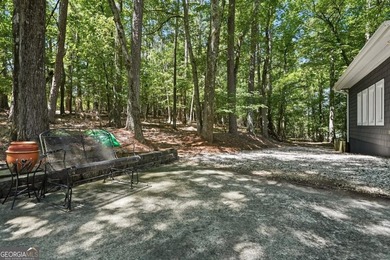 Crafted for generations of gathering, this beautiful lake-area - photo 6