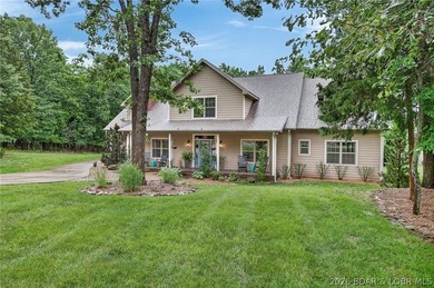Set on a beautifully landscaped, nearly one-acre lot in The - photo 2