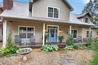Set on a beautifully landscaped, nearly one-acre lot in The - photo 5