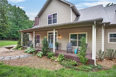 Set on a beautifully landscaped, nearly one-acre lot in The - photo 6