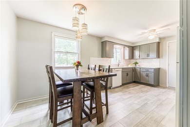 Welcome home to this lovingly maintained split-level, proudly - photo 9