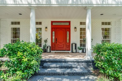 Timeless Elegance Meets Modern Comfort! Nestled on a generous - photo 2