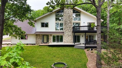 Located in the highly sought-after Four Seasons community, this - photo 2
