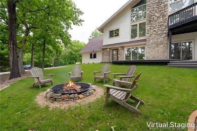 Located in the highly sought-after Four Seasons community, this - photo 3