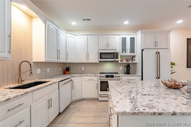 Located in the highly sought-after Four Seasons community, this - photo 6
