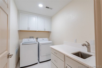 Located in the highly sought-after Four Seasons community, this - photo 9