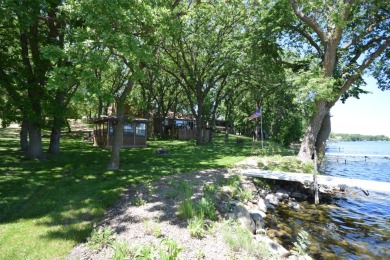 Located on Pickerel Lake with 136 feet of shoreline and two - Lake Home For Sale in Grenville, South Dakota