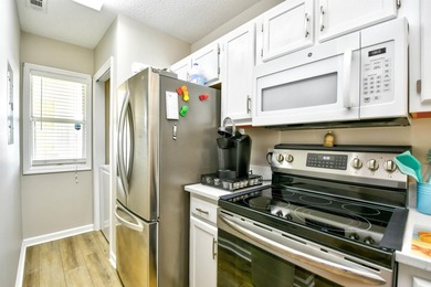 Fabulous End-Unit in Gated Waterway Community! Views for Miles & - photo 12