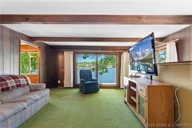 Tucked away on the sought-after Little Niangua Arm, this 3 bed - photo 3