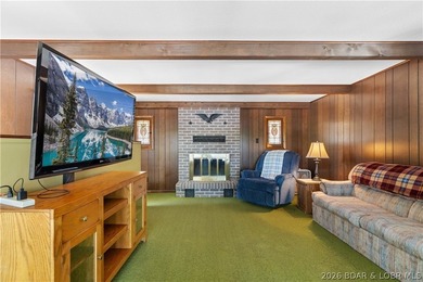Tucked away on the sought-after Little Niangua Arm, this 3 bed - photo 4