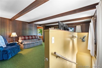 Tucked away on the sought-after Little Niangua Arm, this 3 bed - photo 7