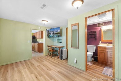 Tucked away on the sought-after Little Niangua Arm, this 3 bed - photo 8