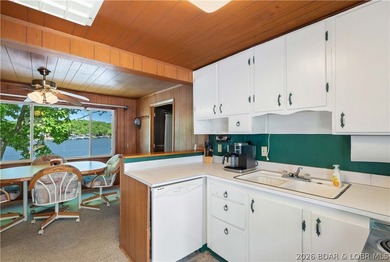 Tucked away on the sought-after Little Niangua Arm, this 3 bed - photo 10