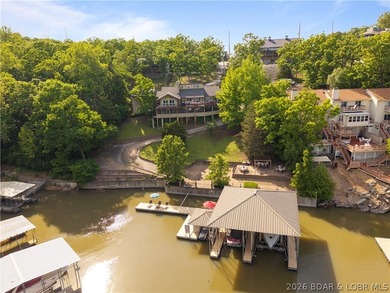 Experience true Lake of the Ozarks living at this exceptional - photo 1